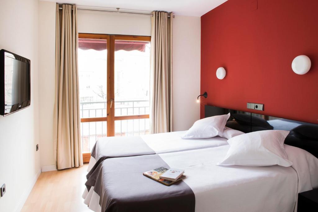 Hospedium Hostal Un Punto Chic Huesca Kamer foto