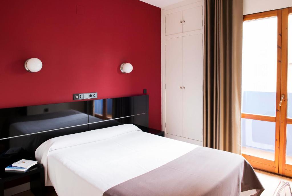 Hospedium Hostal Un Punto Chic Huesca Buitenkant foto